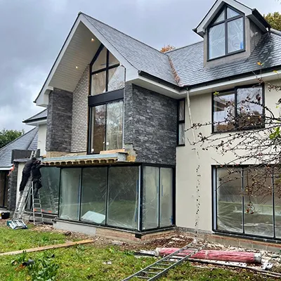 Large new home with scaffolding